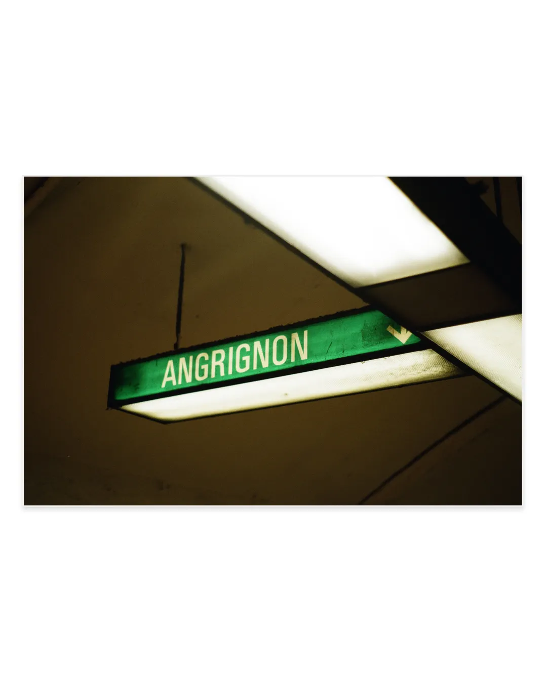montreal metro hangign sign. green line